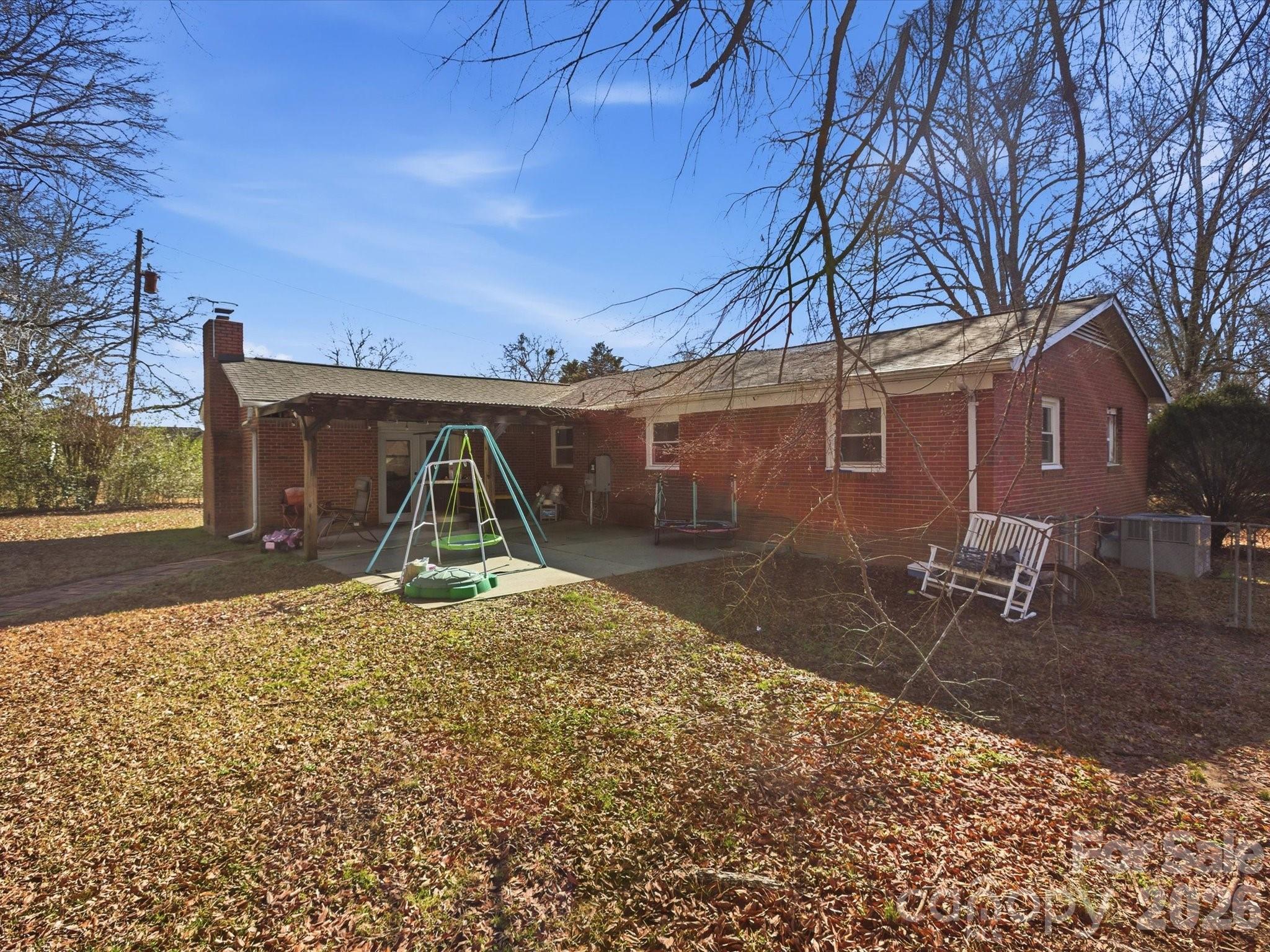 2694 Pineview Drive Lancaster, SC 29720 - Photo 21 of 26 a view of a backyard with table and chairs