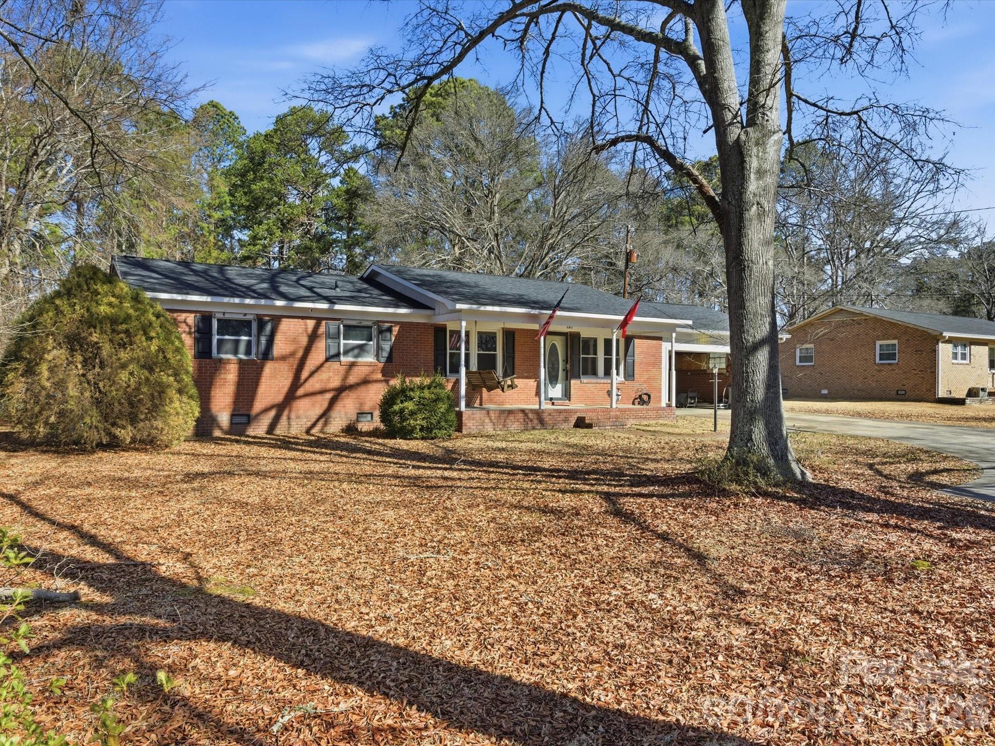 2694 Pineview Drive Lancaster, SC 29720 - Photo 3 of 26 a front view of a house with a yard