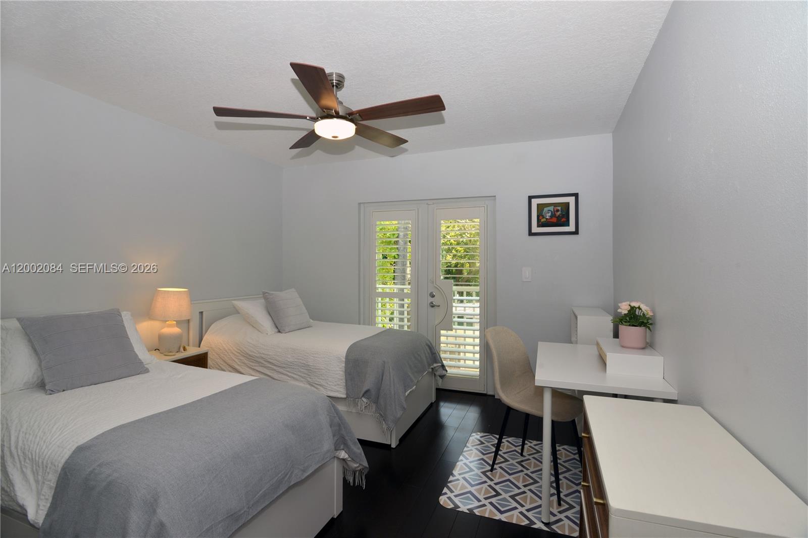 3081 Matilda Street, Unit A Miami, FL 33133 - Photo 11 of 14 a bedroom with a bed and a window