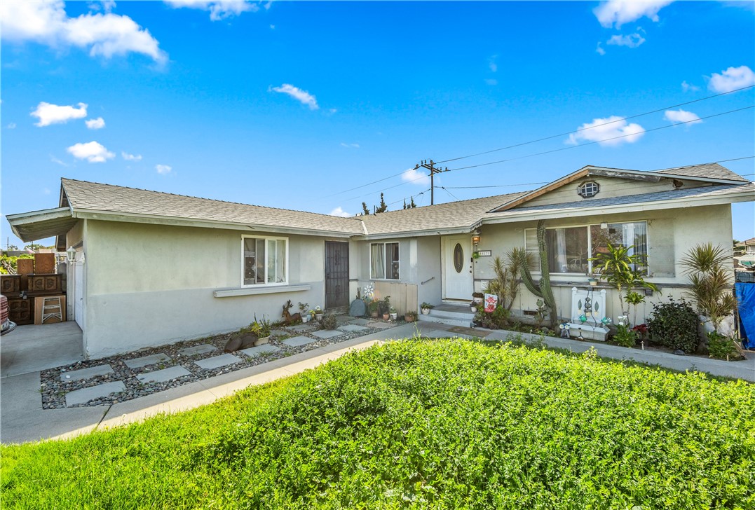 a front view of a house with patio
