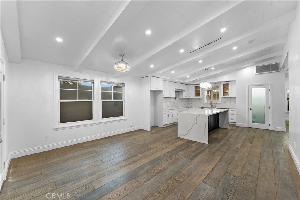 6418 Ringsdale Court Bakersfield, CA 93313 - Photo 21 of 59 a view of kitchen with granite countertop cabinets and wooden floor