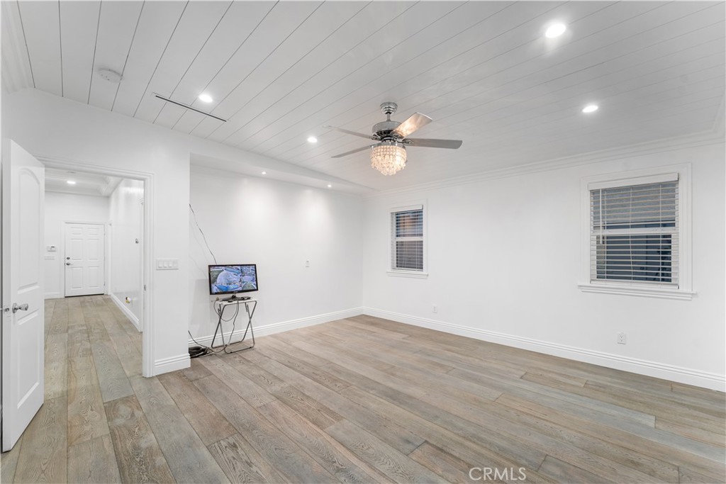 6418 Ringsdale Court Bakersfield, CA 93313 - Photo 26 of 59 a view of livingroom with hardwood floor and a ceiling fan