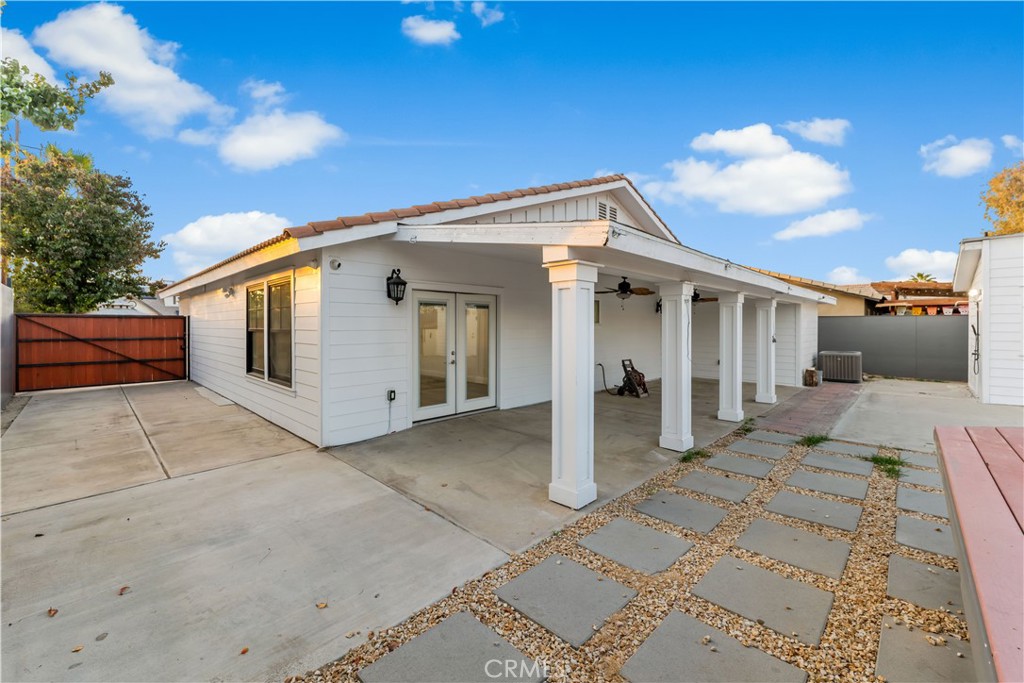 6418 Ringsdale Court Bakersfield, CA 93313 - Photo 54 of 59 a view of a white house with a large windows