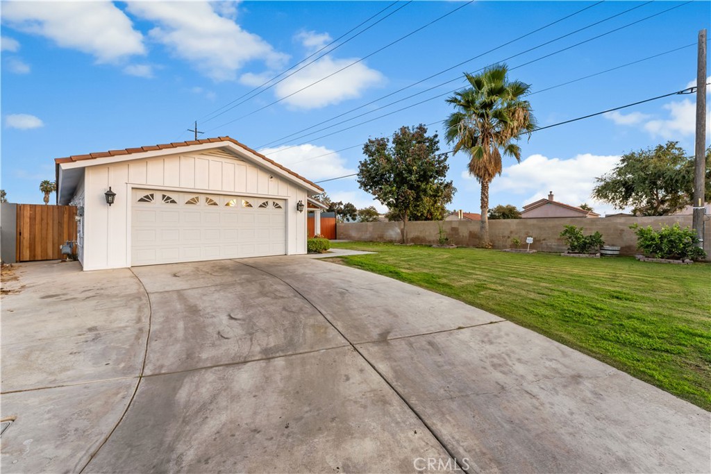 6418 Ringsdale Court Bakersfield, CA 93313 - Photo 56 of 59 a view of garage with a tree