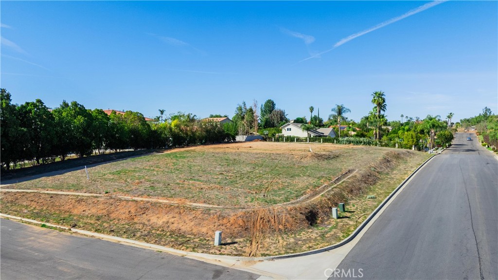 16460 Landon Court Riverside, CA 92504 - Photo 1 of 18 a view of a swimming pool with a yard
