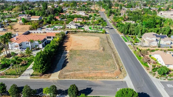 an aerial view of residential house with outdoor space