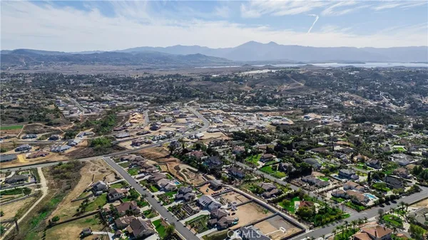 an aerial view of residential house and outdoor space