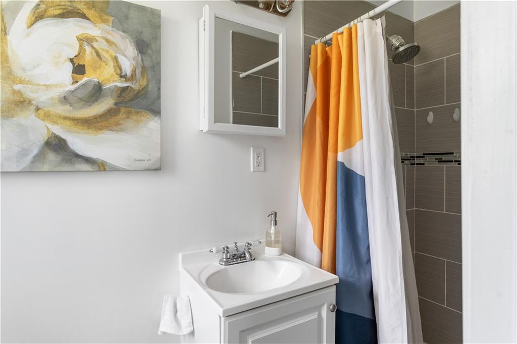 2175 Glendale Drive Decatur, GA 30032 - Photo 15 of 21 a bathroom with a sink and a mirror