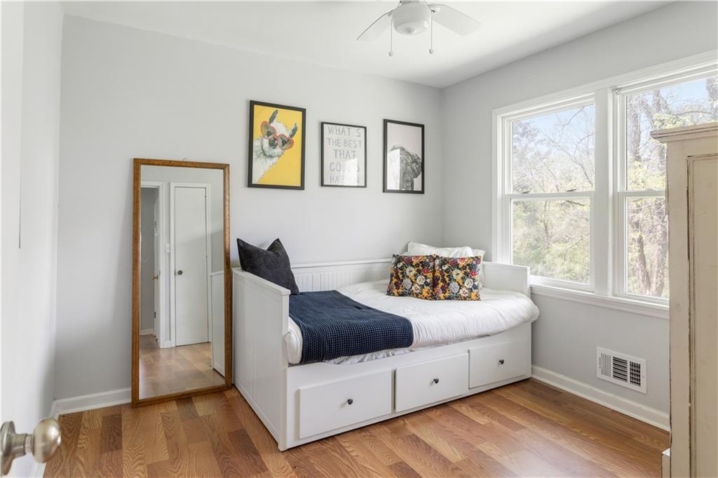2175 Glendale Drive Decatur, GA 30032 - Photo 18 of 21 a spacious bedroom with a bed and a window