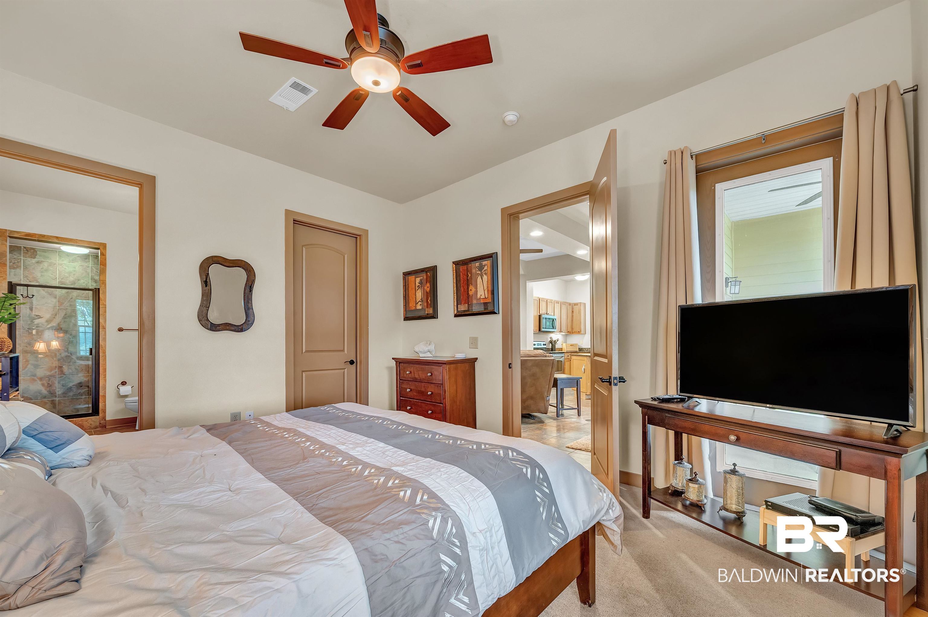 1430 Regency Road, Unit C201 Gulf Shores, AL 36542 - Photo 4 of 54 Bedroom with carpet floors and ceiling fan