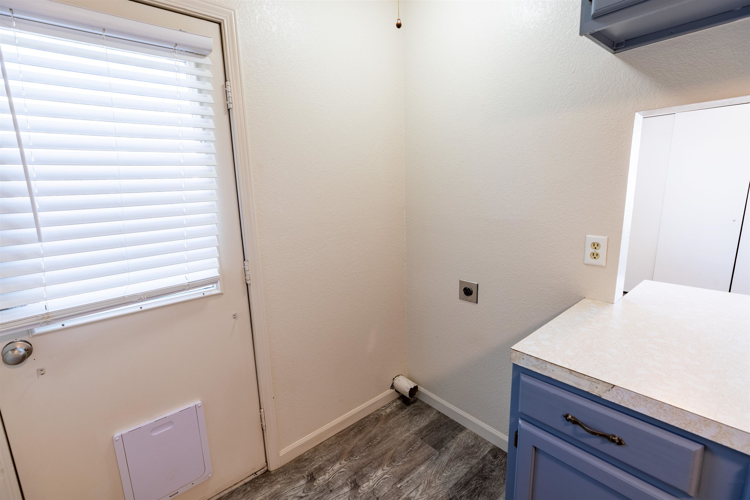 239 South Elm Street, Unit A Fruita, CO 81521 - Photo 10 of 22 a room with a sink and wooden floor