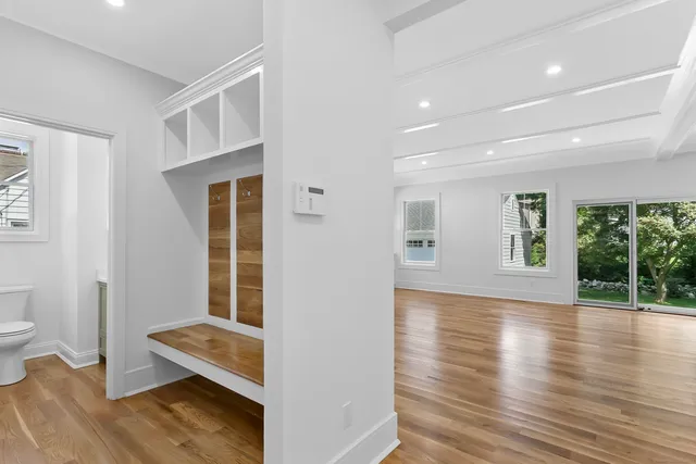 a view of livingroom with hardwood floor and a ceiling fan