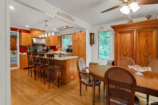 a view of a dining room with furniture window and outside view