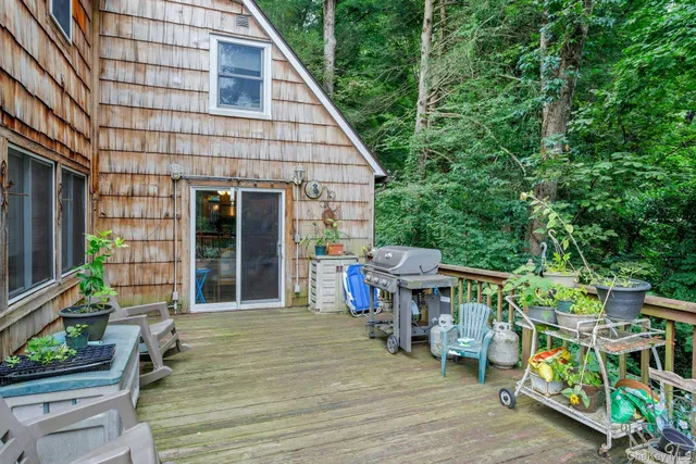 a view of house with outdoor seating space