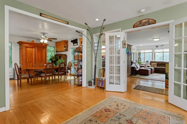 a lobby with furniture and a dining table