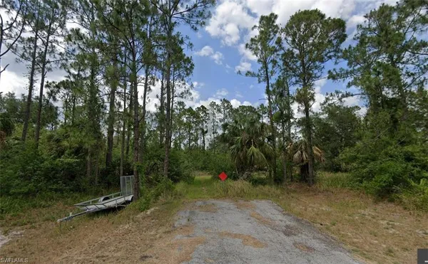 a view of outdoor space and yard