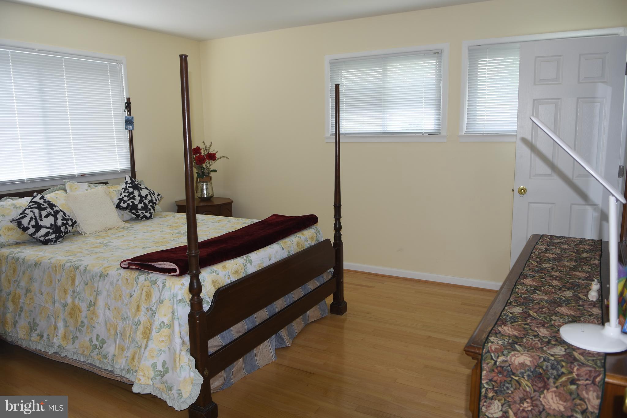 8127 Carrick Lane Springfield, VA 22151 - Photo 7 of 15 a room with a bed and a window