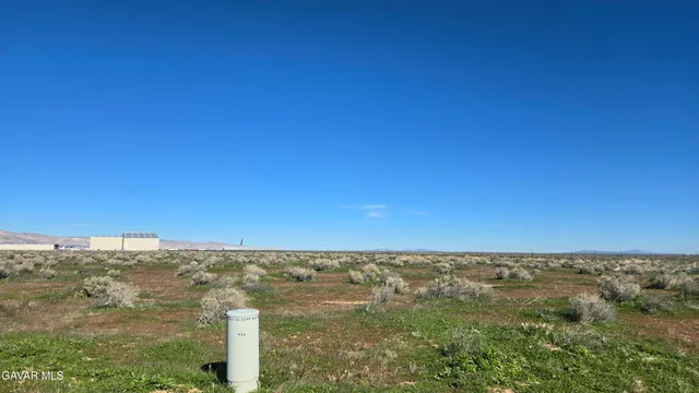 a view of mountain view with mountains in the background