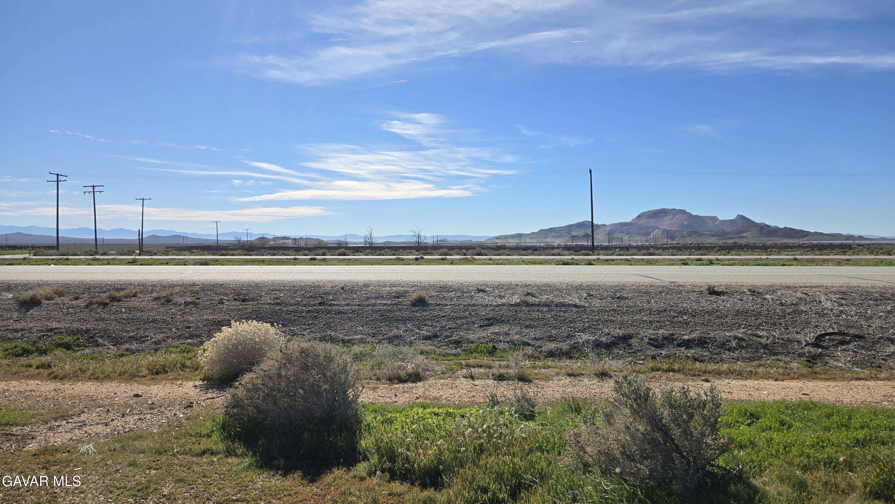 58 Business & Lonebutte Road Mojave, CA 93501 - Photo 16 of 42 a view of a lake with a big yard