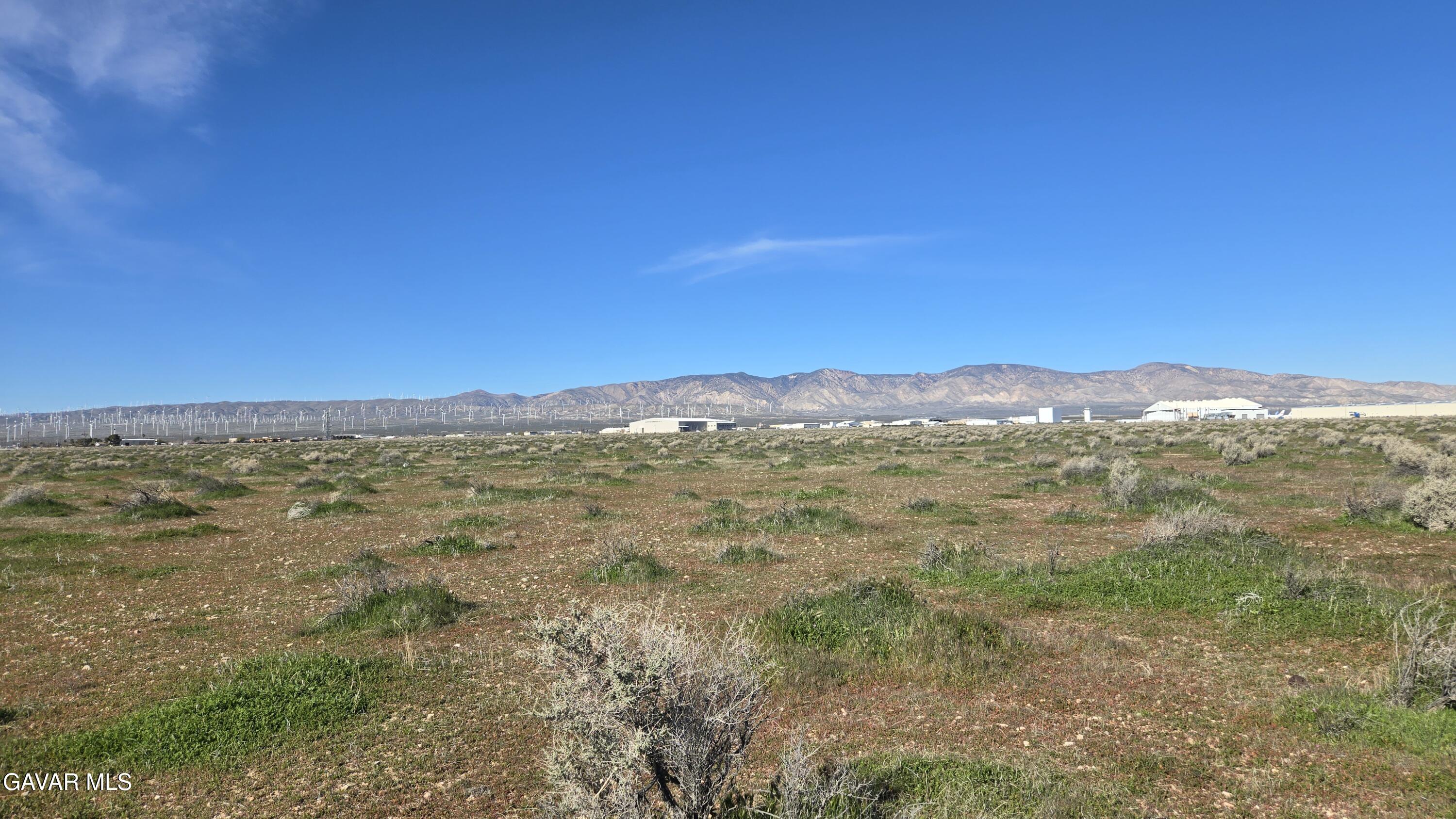 58 Business & Lonebutte Road Mojave, CA 93501 - Photo 34 of 42 a view of a large body of water with a mountain in the background