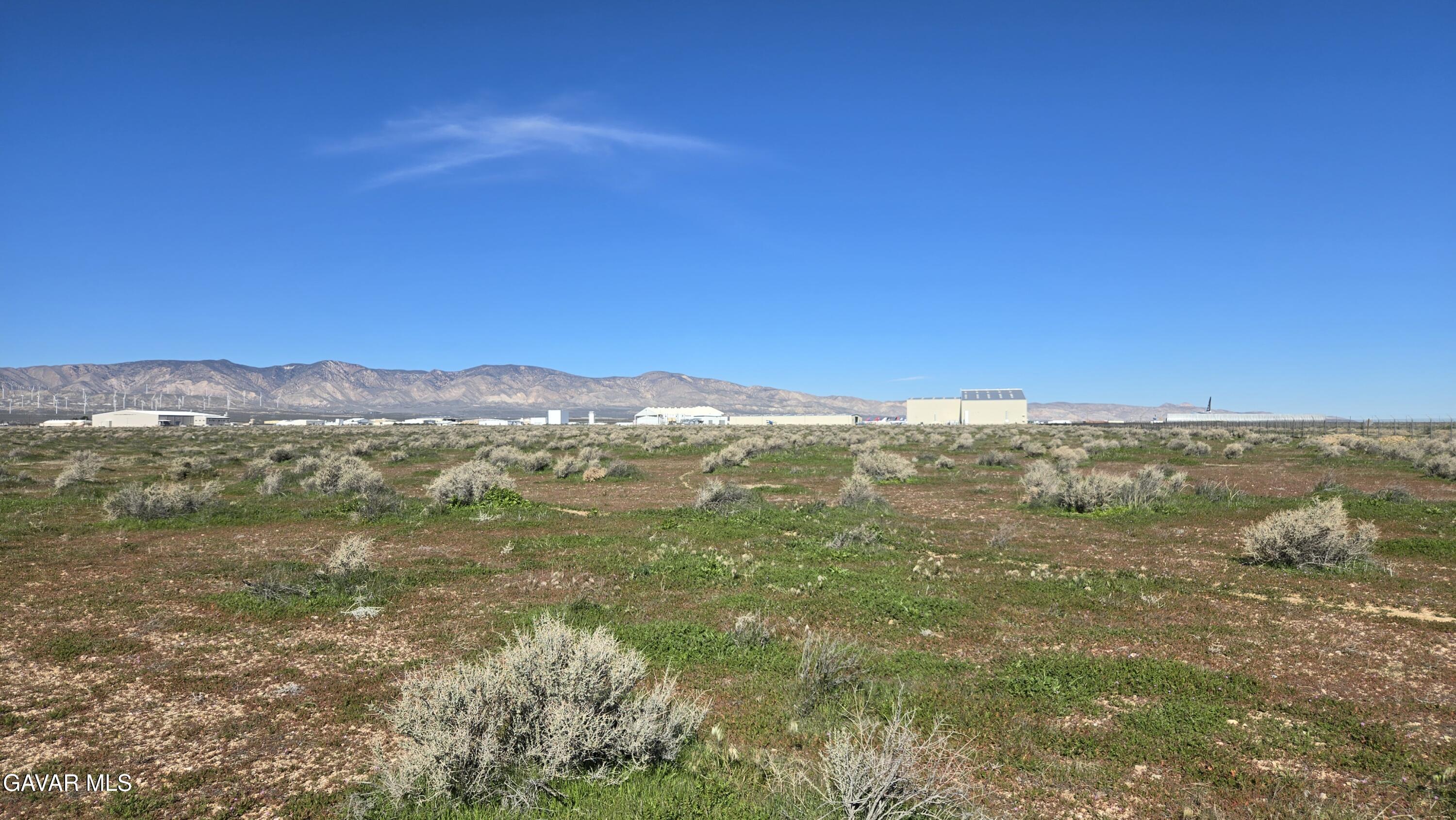 58 Business & Lonebutte Road Mojave, CA 93501 - Photo 4 of 42 a view of a city with lush green forest