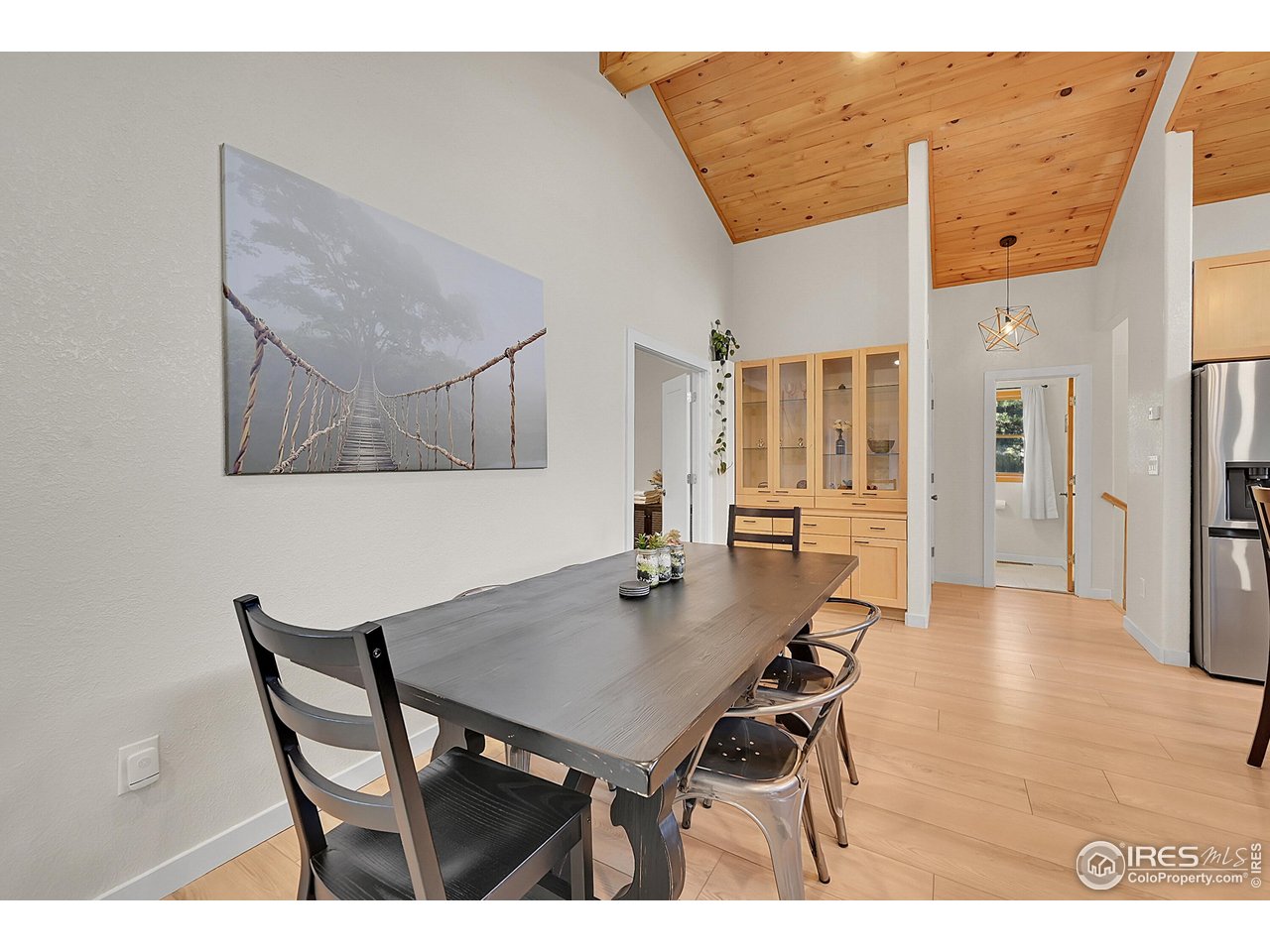 342 Brook Circle Boulder, CO 80302 - Photo 16 of 25 a dining room with furniture and wooden floor