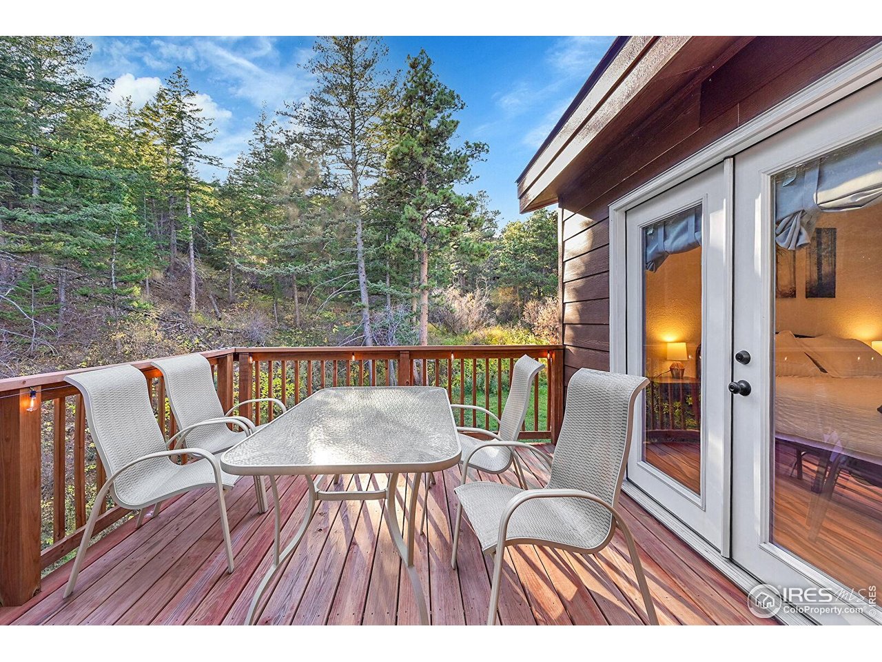 342 Brook Circle Boulder, CO 80302 - Photo 23 of 25 a view of balcony with a potted plant and outdoor seating
