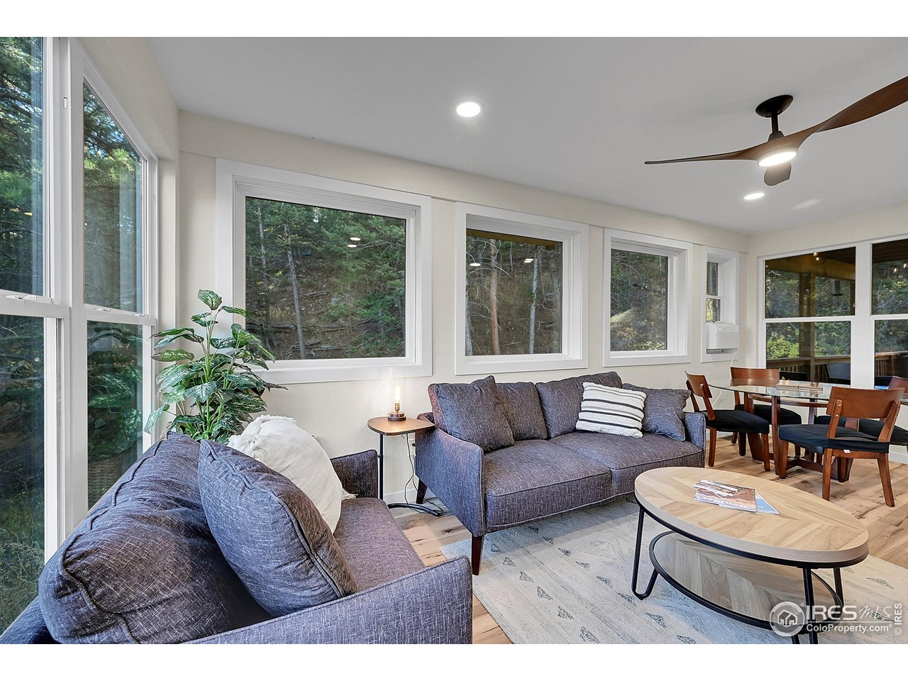 342 Brook Circle Boulder, CO 80302 - Photo 10 of 25 a living room with furniture and a window