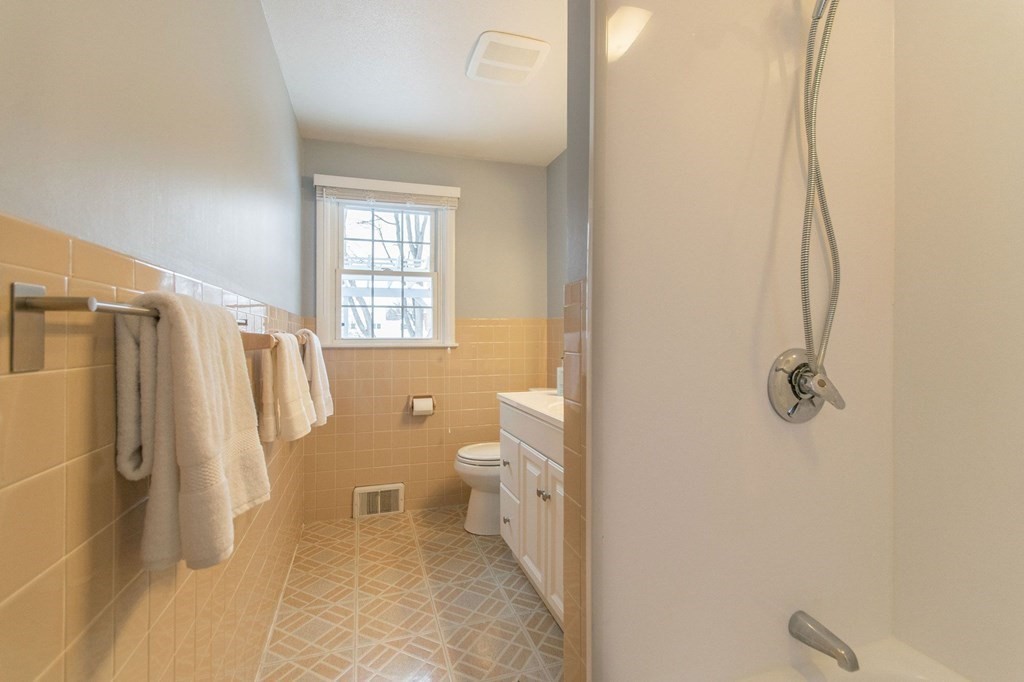 214 Captain Road Longmeadow, MA 01106 - Photo 16 of 29 a bathroom with a sink toilet and shower