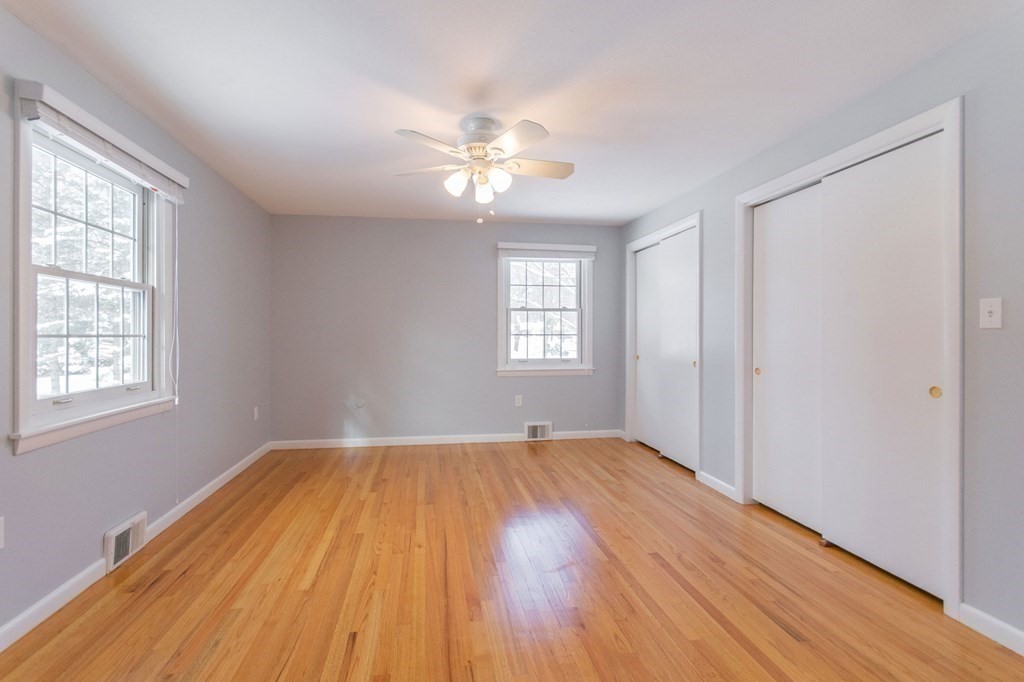 214 Captain Road Longmeadow, MA 01106 - Photo 19 of 29 wooden floor in an empty room with a window