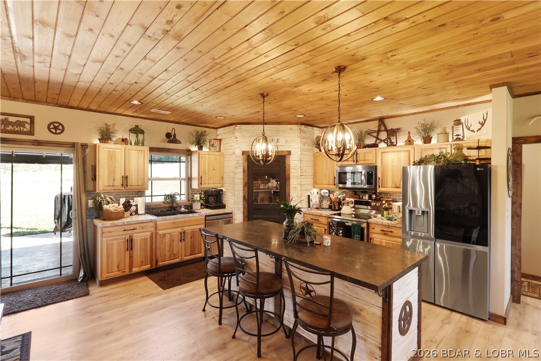 118 Uncle Dee Road Brumley, MO 65017 - Photo 17 of 57 Big island for meal prep.