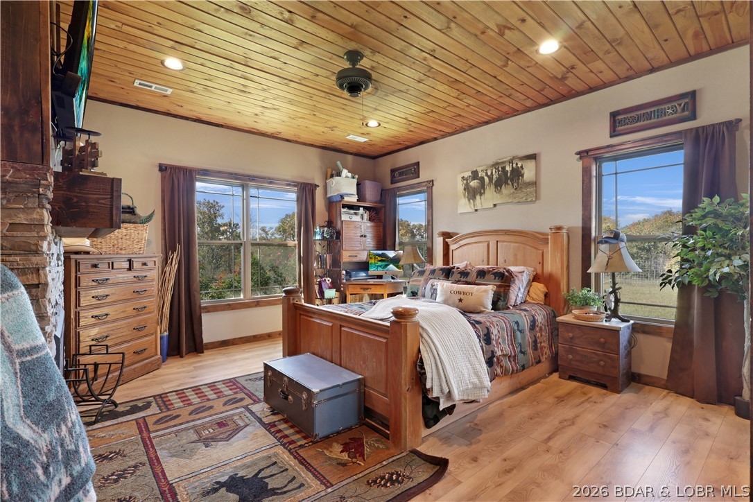 118 Uncle Dee Road Brumley, MO 65017 - Photo 23 of 57 Nice big windows to bring nature in.