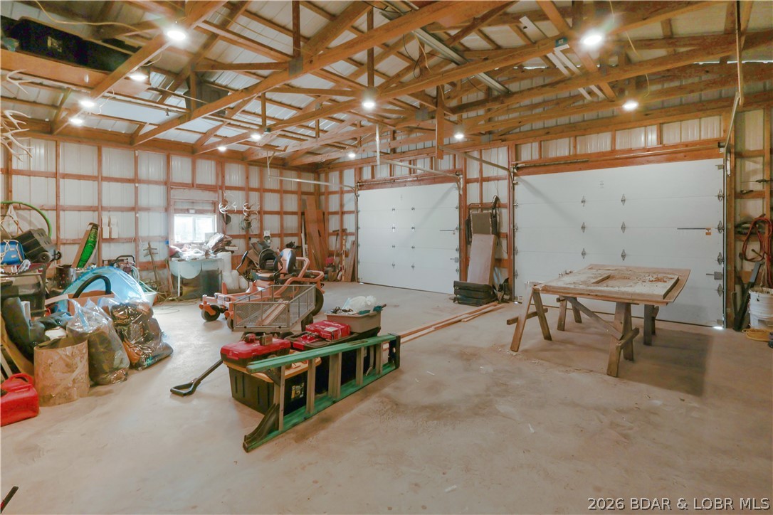 118 Uncle Dee Road Brumley, MO 65017 - Photo 41 of 57 Big, big, shop with 3 garage doors.