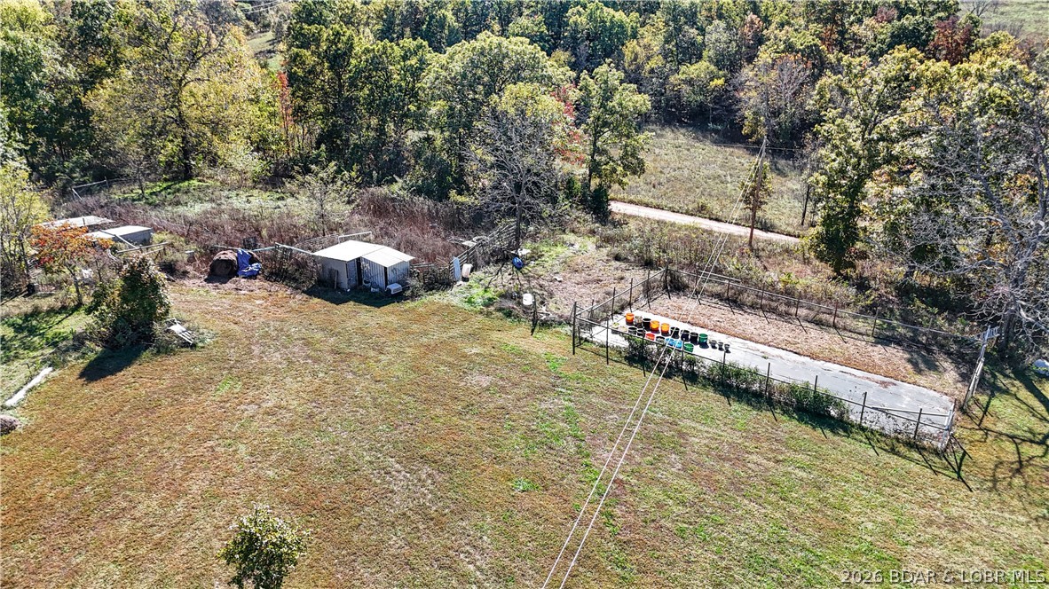 118 Uncle Dee Road Brumley, MO 65017 - Photo 47 of 57 They even had pigs here in this back corner.