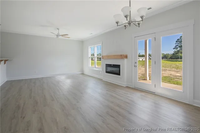 a bathroom with a granite countertop toilet and a shower