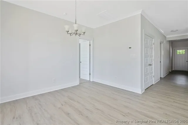 a bathroom with a granite countertop toilet a sink and a bathtub