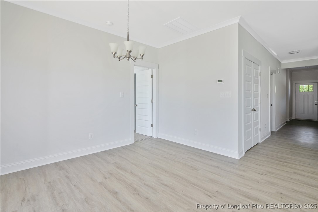 4905 High Branch Court Stedman, NC 28391 - Photo 15 of 47 a view of a room with wooden floor
