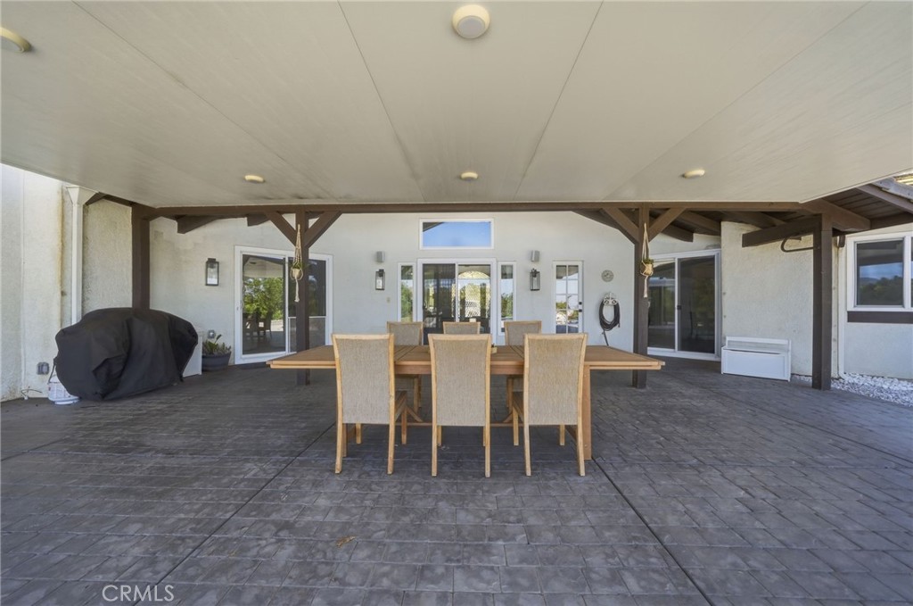 41110 Los Ranchos Circle Temecula, CA 92592 - Photo 53 of 77 a view of a dining room with furniture