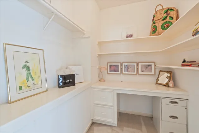 a spacious bathroom with a double vanity sink a mirror and a bathtub