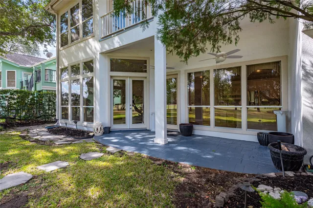 a view of a house with a yard and sitting area