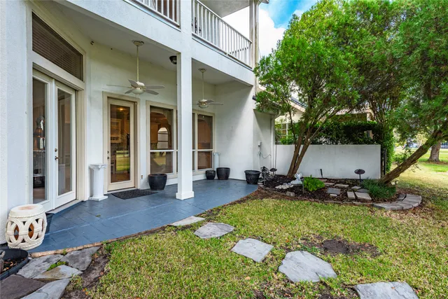 a view of a park with large trees