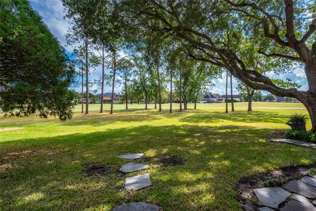 a building with trees in the background
