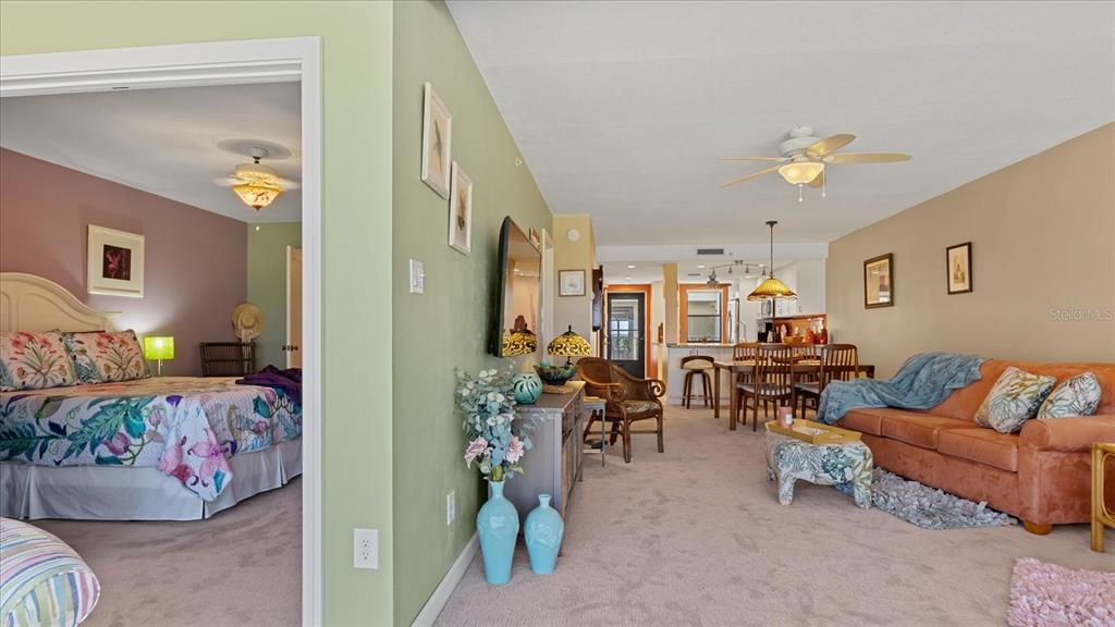 1701 Beach Road, Unit 312 Englewood, FL 34223 - Photo 14 of 39 a living room with furniture and dining area