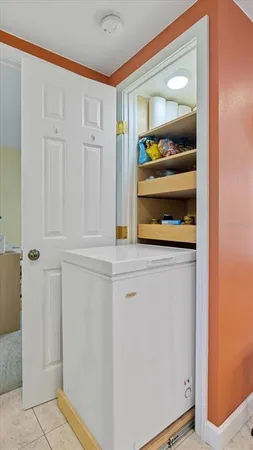 a bathroom with a granite countertop sink a toilet and a mirror
