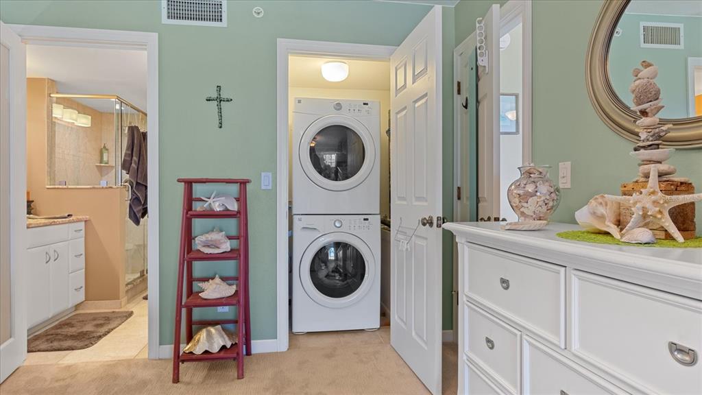 1701 Beach Road, Unit 312 Englewood, FL 34223 - Photo 30 of 39 a utility room with dryer and washer