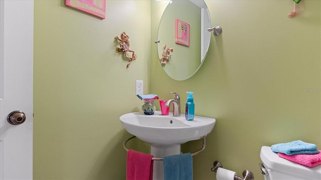 1701 Beach Road, Unit 312 Englewood, FL 34223 - Photo 34 of 39 a bathroom with a sink and a mirror