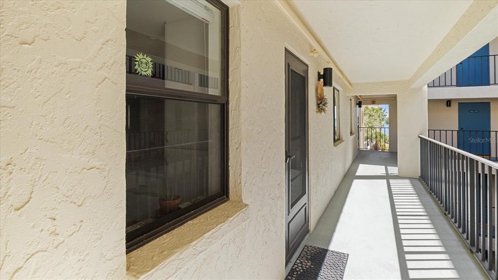 1701 Beach Road, Unit 312 Englewood, FL 34223 - Photo 36 of 39 a view of a balcony from door