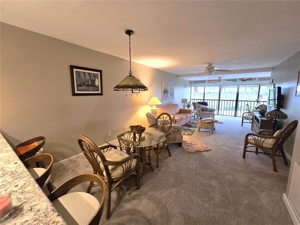 1701 Beach Road, Unit 312 Englewood, FL 34223 - Photo 10 of 39 a living room with furniture