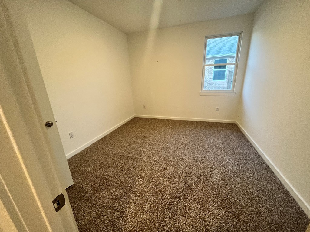 2012 Bobtail Pass Leander, TX 78641 - Photo 15 of 22 Carpeted spare room with baseboards