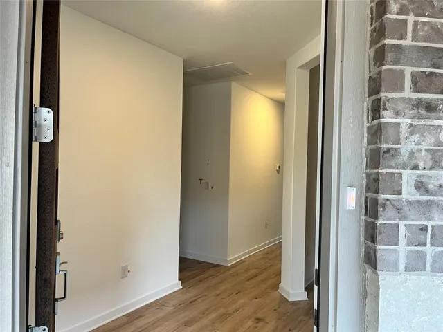 a view of a bathroom with a glass door